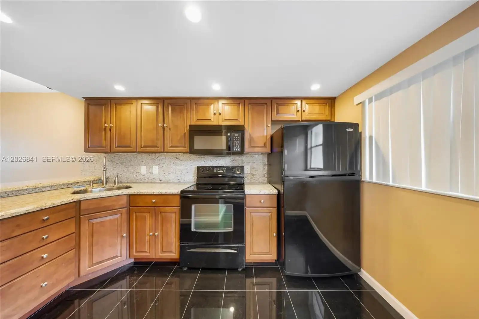 6075 N Sabal Palm Blvd # 210, Tamarac FL 33319