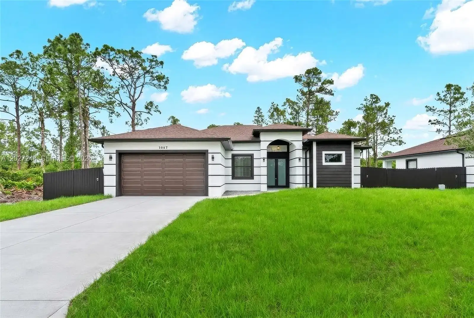 1047 E Merry St, Lehigh Acres FL 33974 photo 2