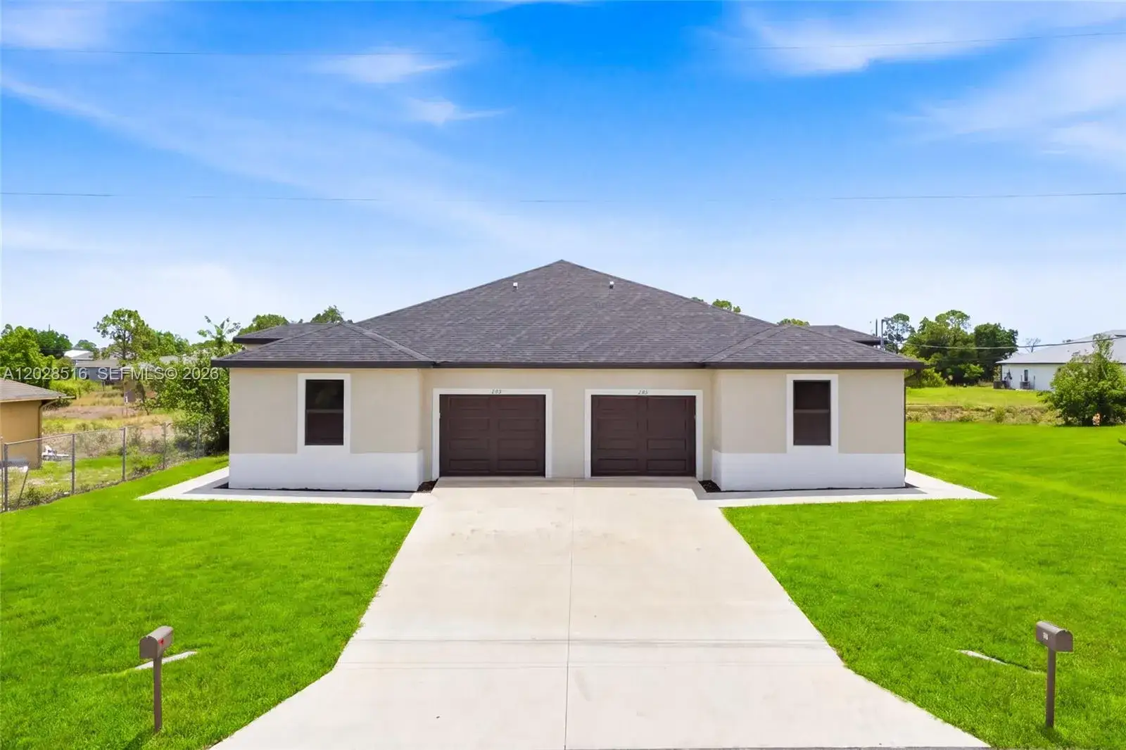 225/227 Hightower AVE S, Lehigh Acres FL 33973