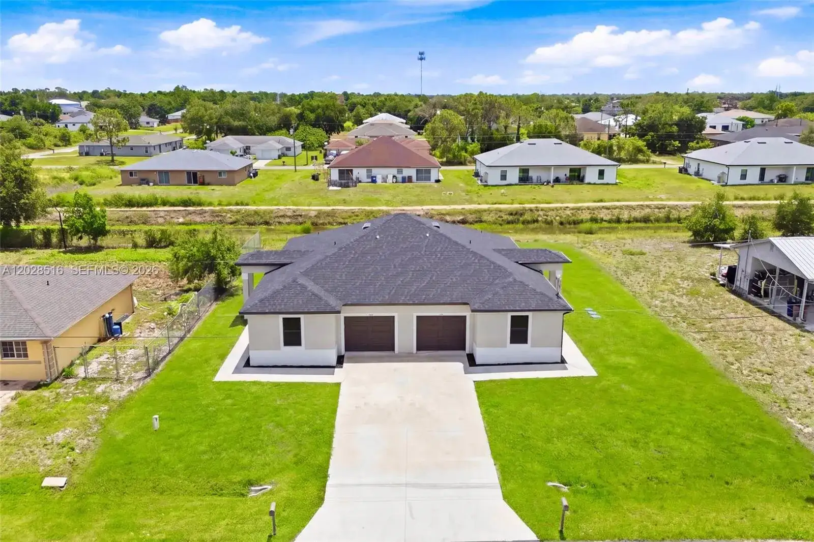 225/227 Hightower AVE S, Lehigh Acres FL 33973 photo 3