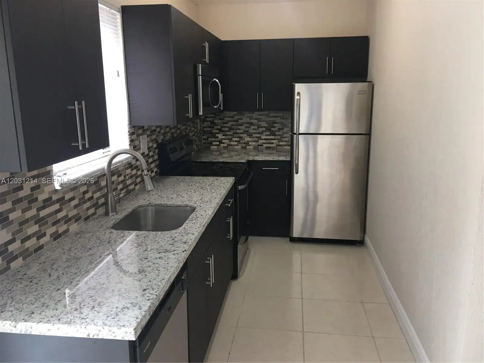 1594 NE 155th Ter, North Miami Beach FL 33162 photo 3