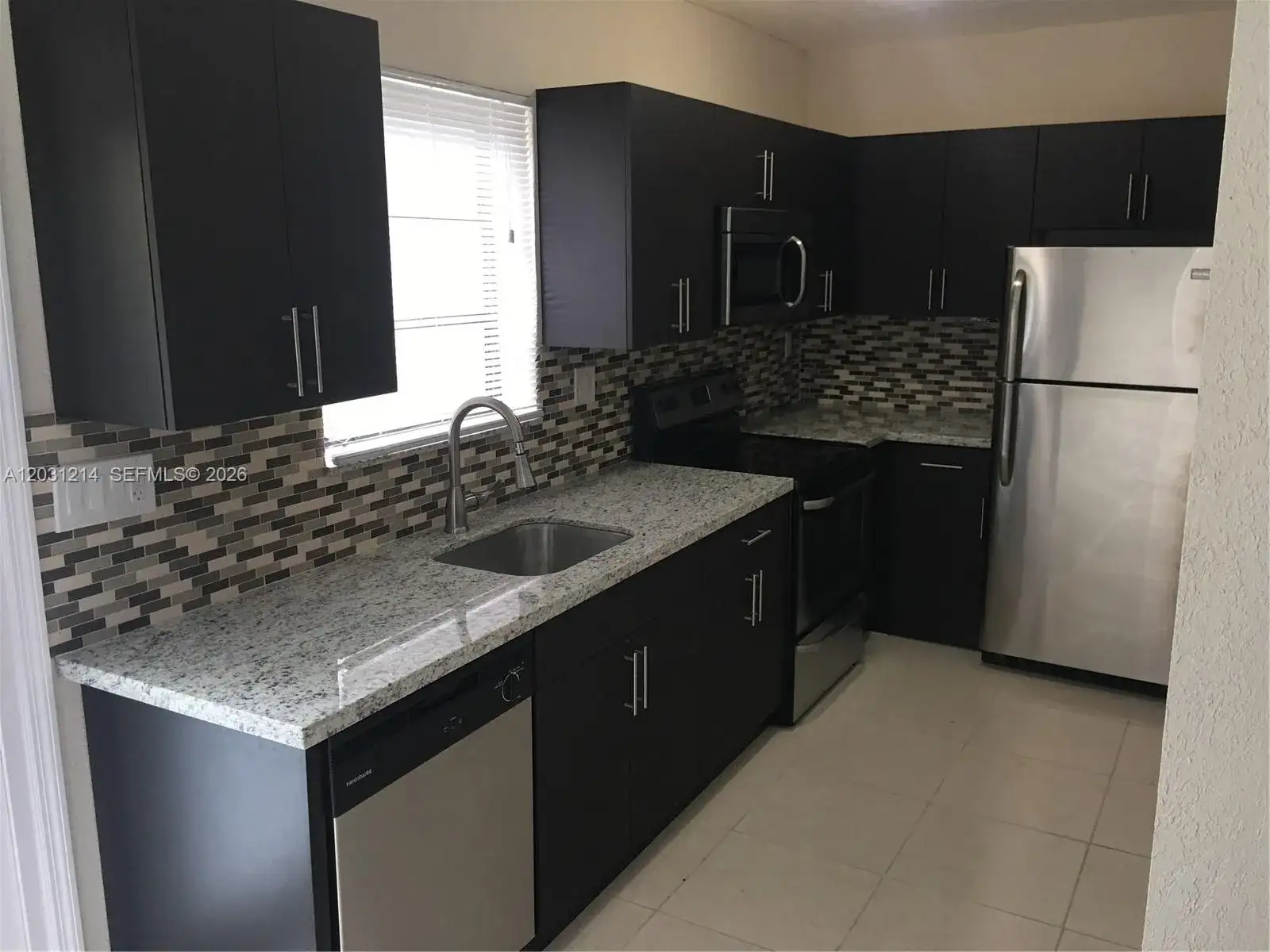 1594 NE 155th Ter, North Miami Beach FL 33162 photo 4