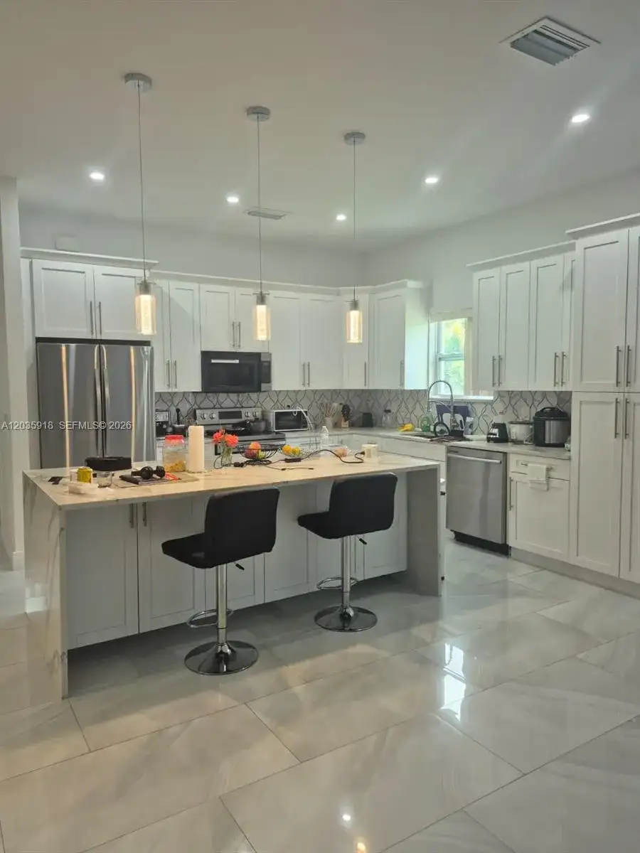 3642 32ND AVE SE, Naples FL 34117 photo 4