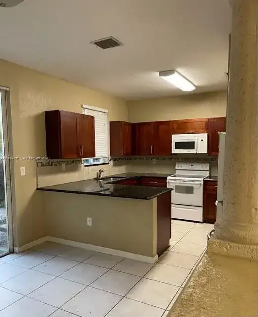 6970 NW 177th St # M104, Hialeah FL 33015 photo 2