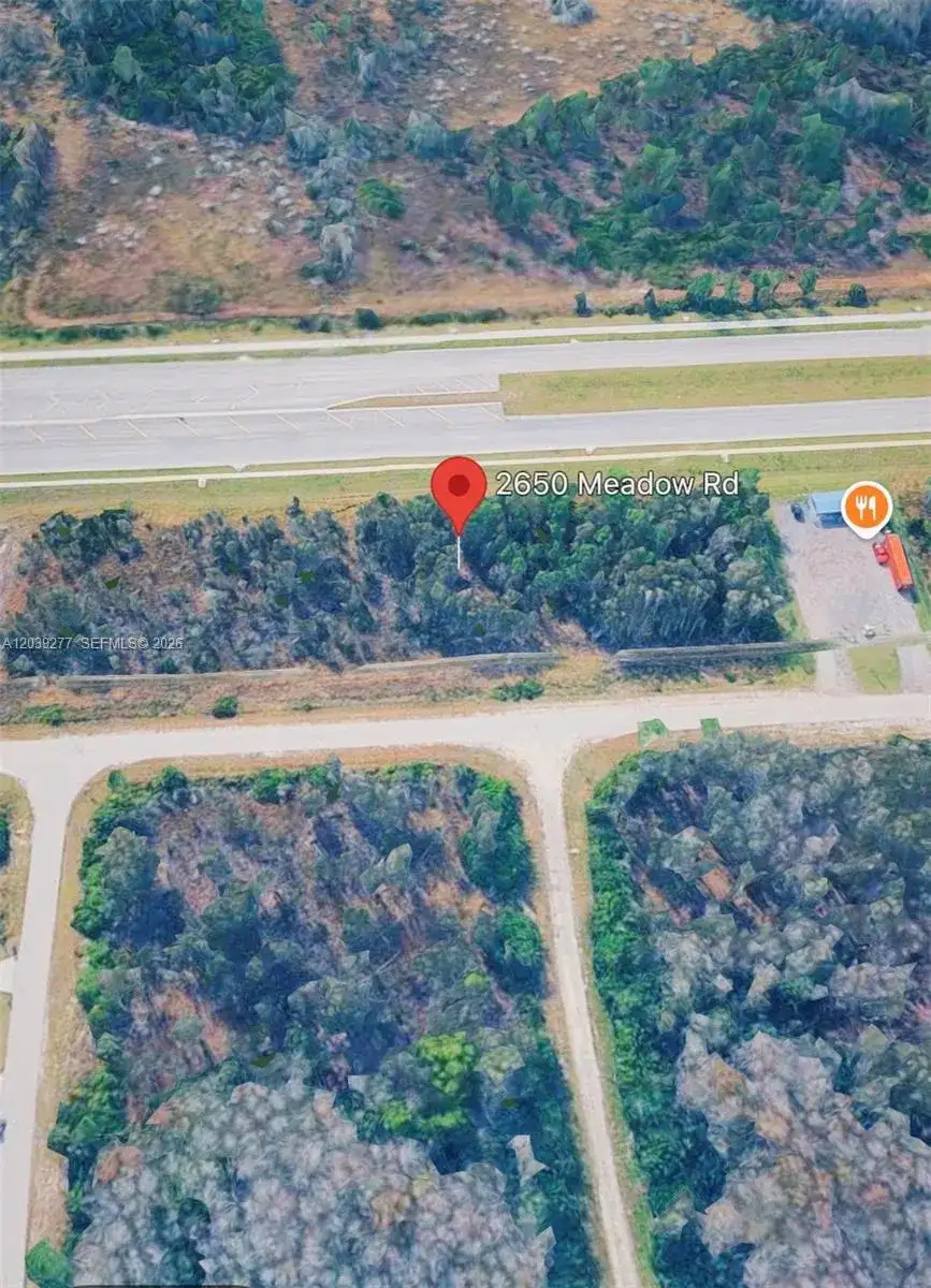 2650 Meadow RD, Lehigh Acres FL 33974 photo 3