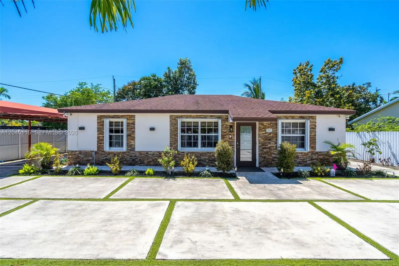 302 NW 100th St, Miami FL 33150