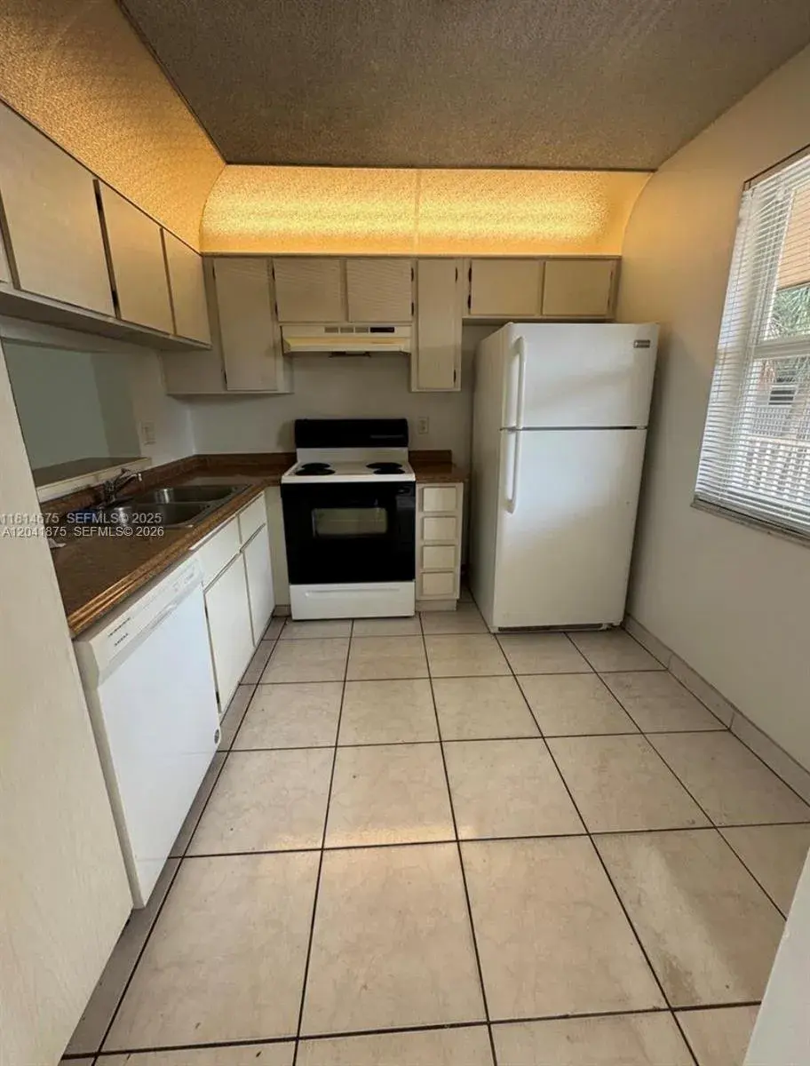 8750 Royal Palm Blvd # 209, Coral Springs FL 33065