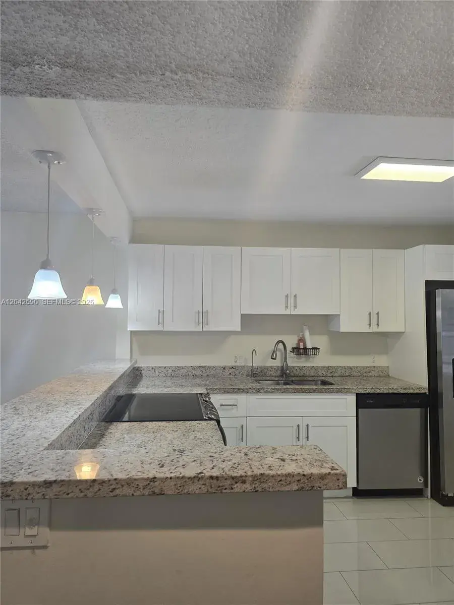16581 Blatt Blvd # 104, Weston FL 33326