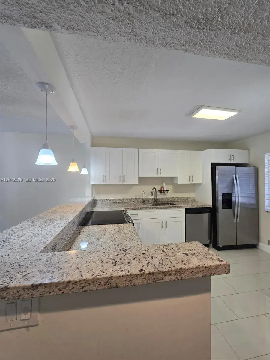16581 Blatt Blvd # 104, Weston FL 33326