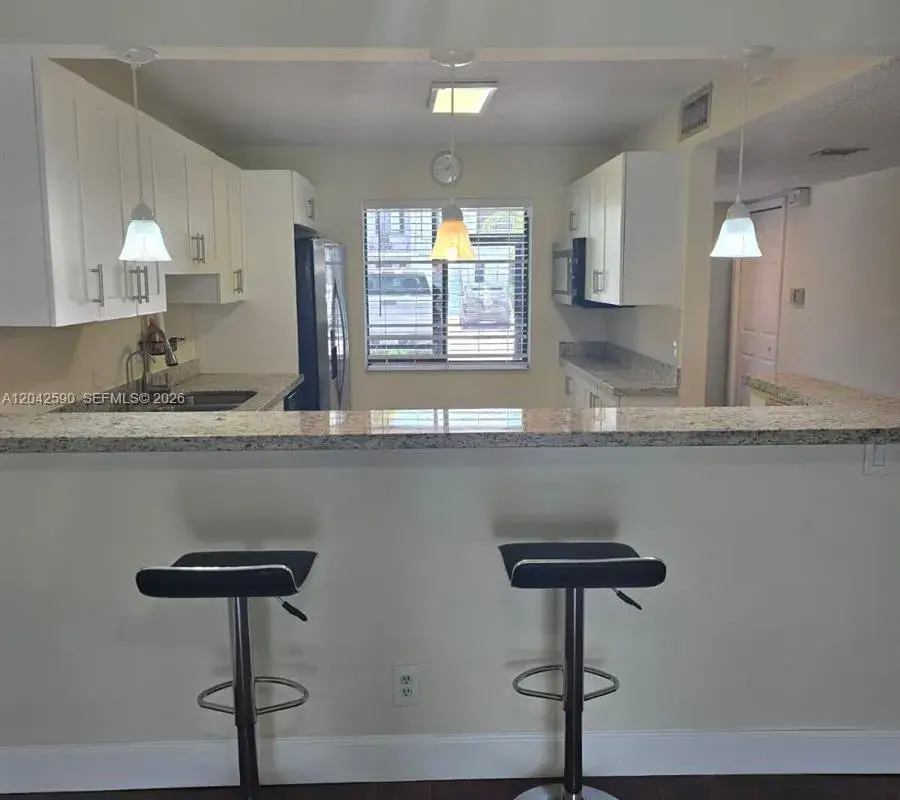 16581 Blatt Blvd # 104, Weston FL 33326