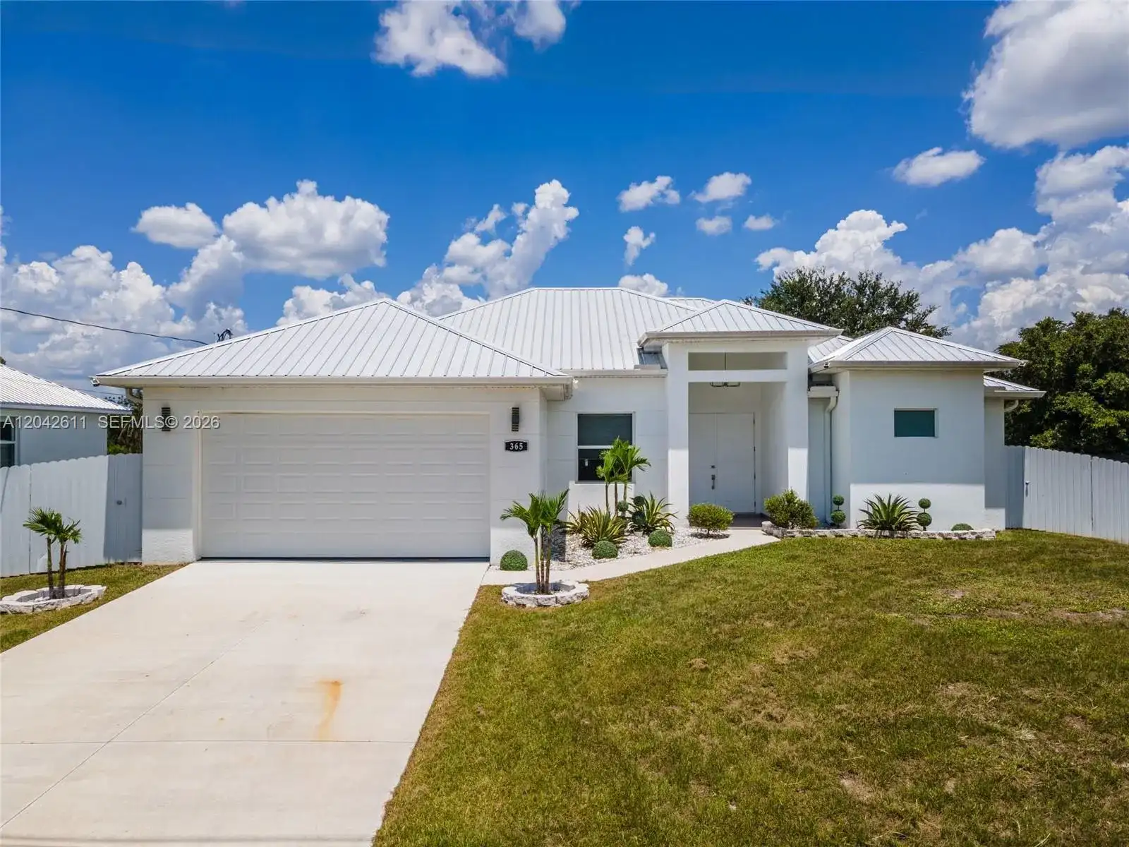 365 Ranier Ave, Lehigh Acres FL 33974 photo 2