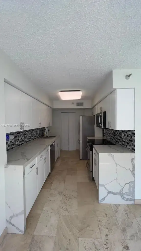 3530 Mystic Pointe Dr # 405, Aventura FL 33180