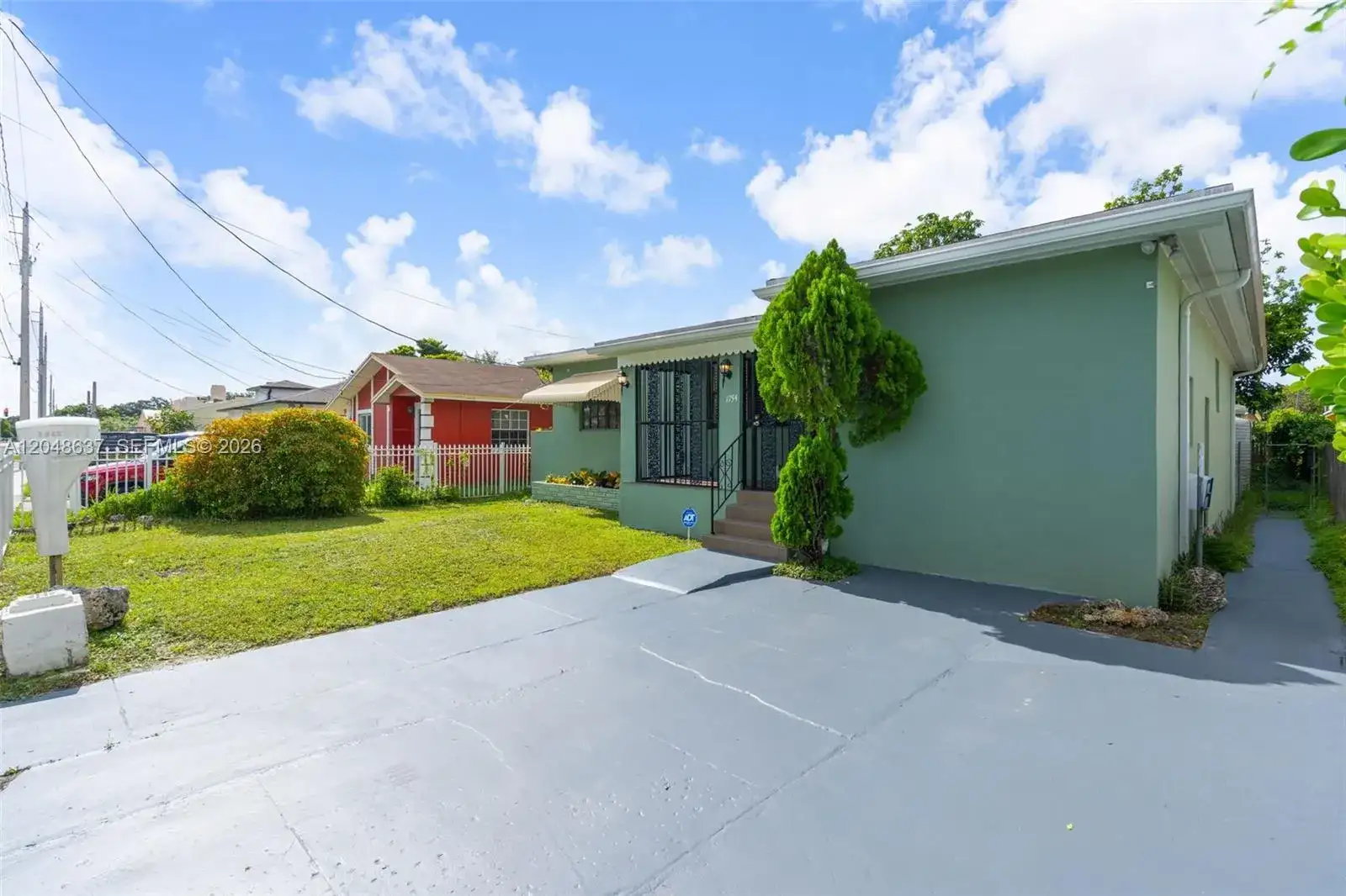 1754 NW 56th St, Miami FL 33142 photo 2