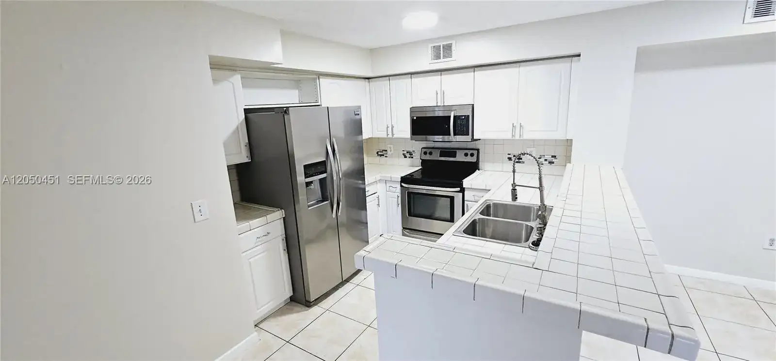 1707 Village Blvd # 208, West Palm Beach FL 33409 photo 2