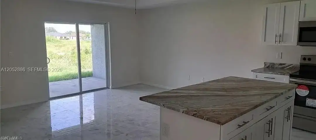 2225/2227 Snead Drive, Lehigh Acres FL 33973 photo 4