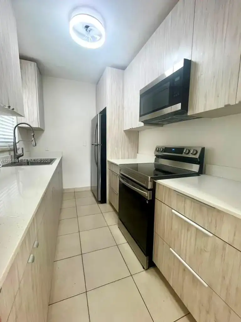 1679 NE 176 ST, North Miami Beach FL 33162 photo 2