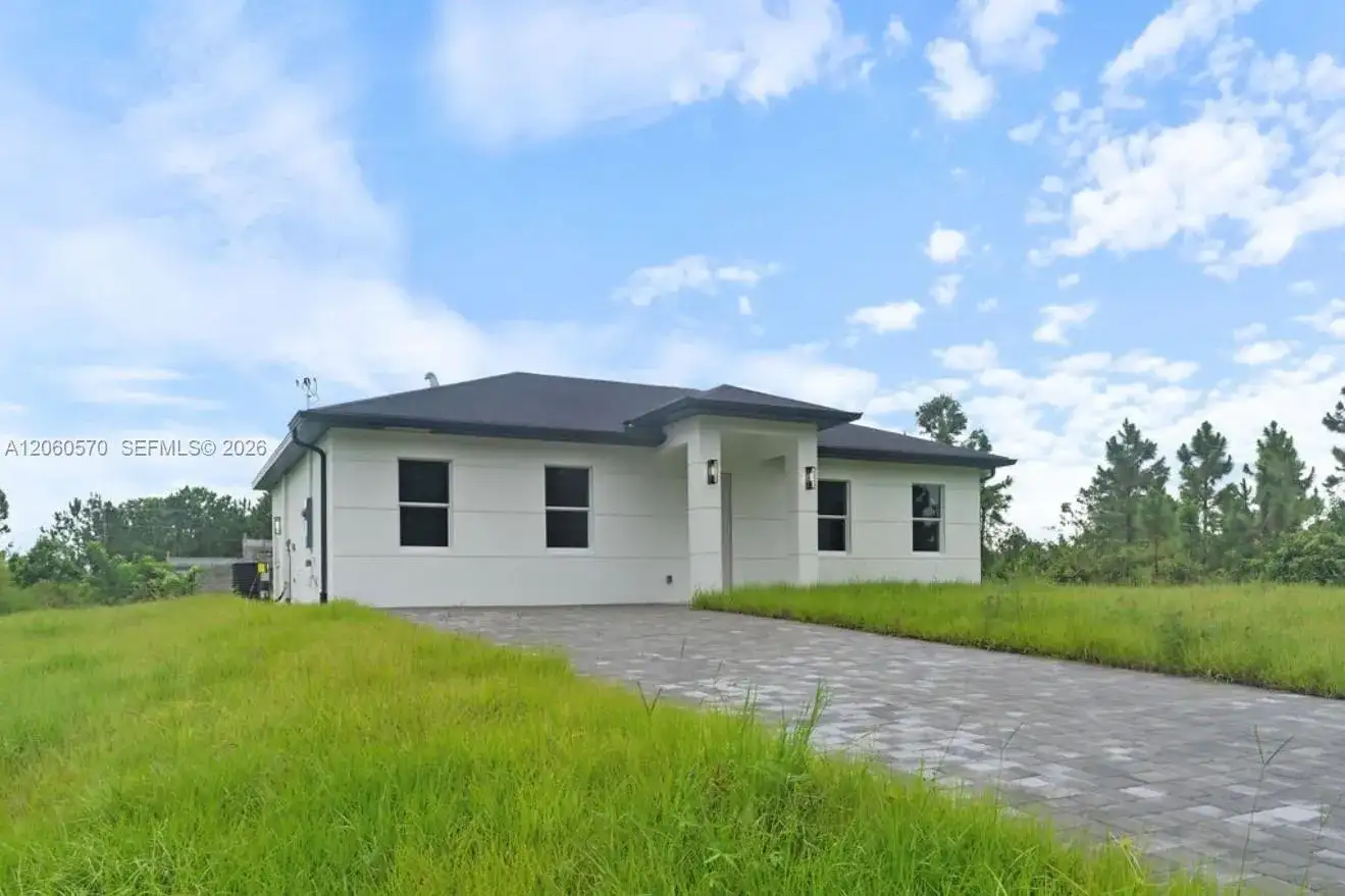 708 PEACOCK AVE, Lehigh Acres FL 33974 photo 2