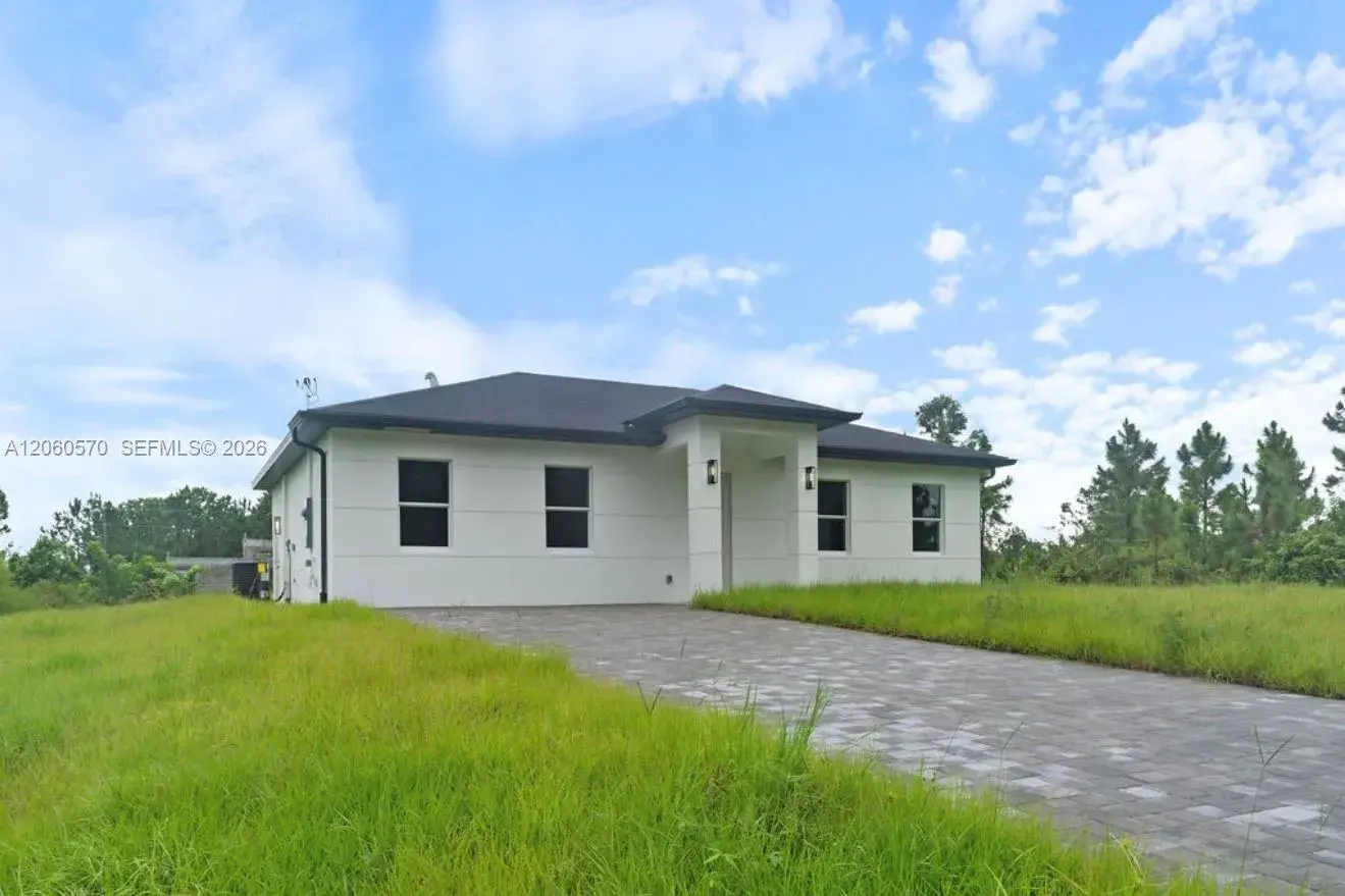 708 PEACOCK AVE, Lehigh Acres FL 33974