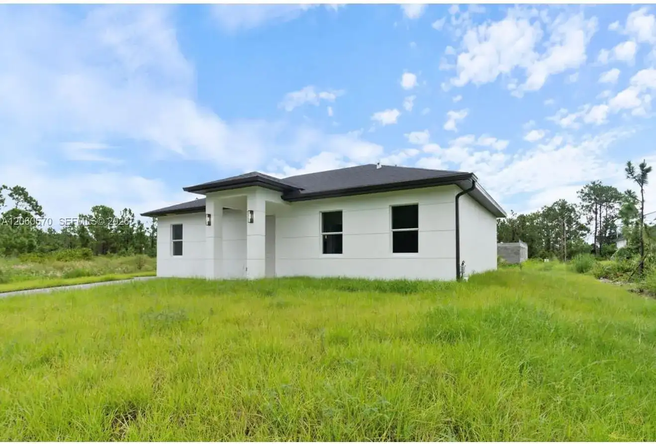 708 PEACOCK AVE, Lehigh Acres FL 33974 photo 3