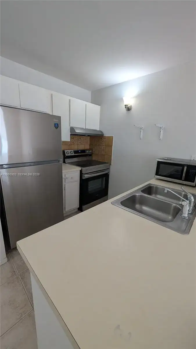 2701 Riverside Dr # B, Coral Springs FL 33065 photo 2