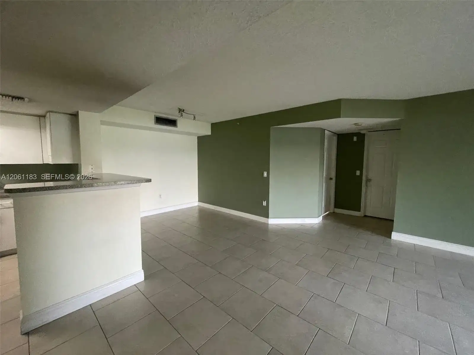 5005 Wiles Rd # 102, Coconut Creek FL 33073 photo 2