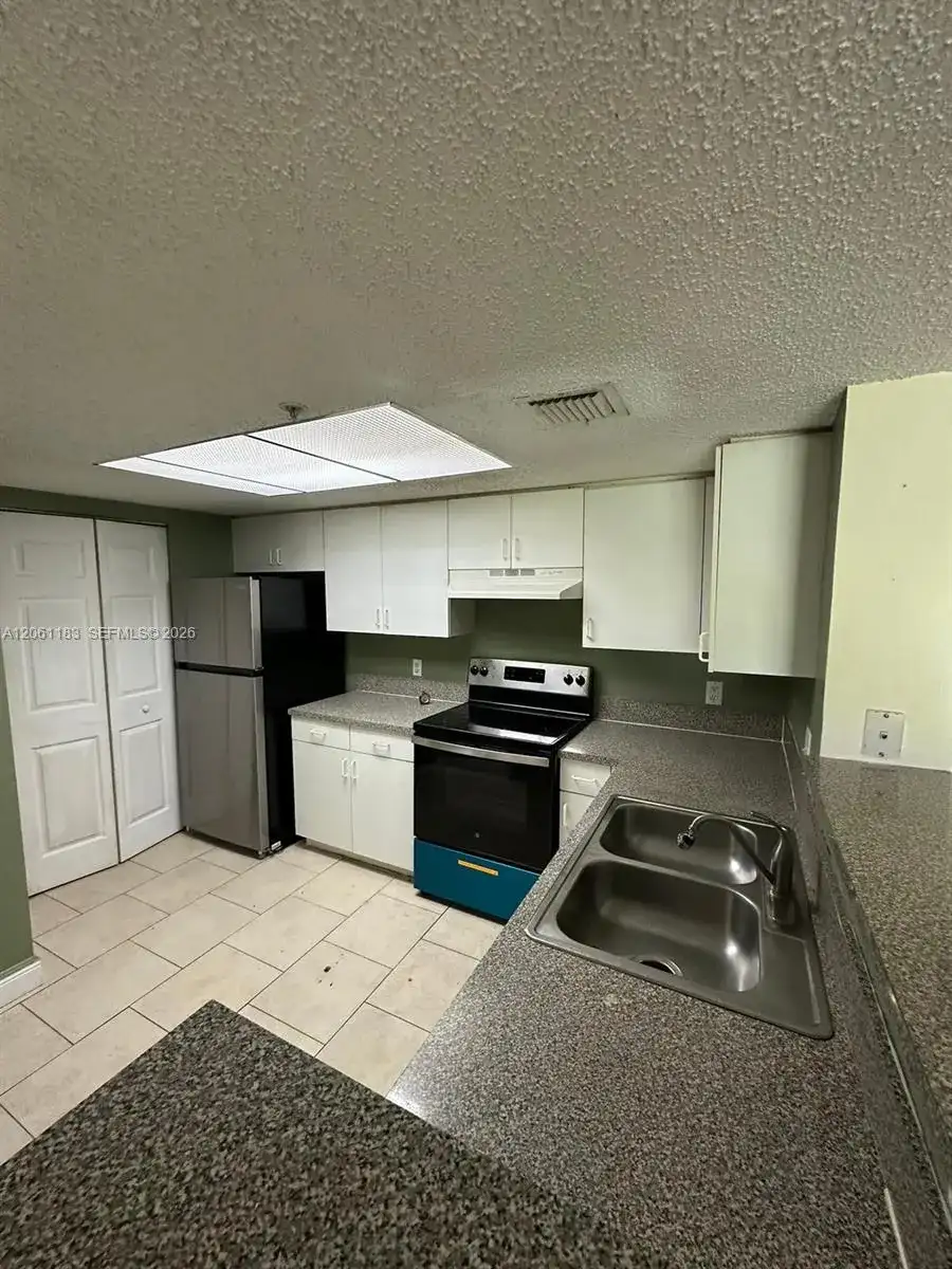 5005 Wiles Rd # 102, Coconut Creek FL 33073 photo 5