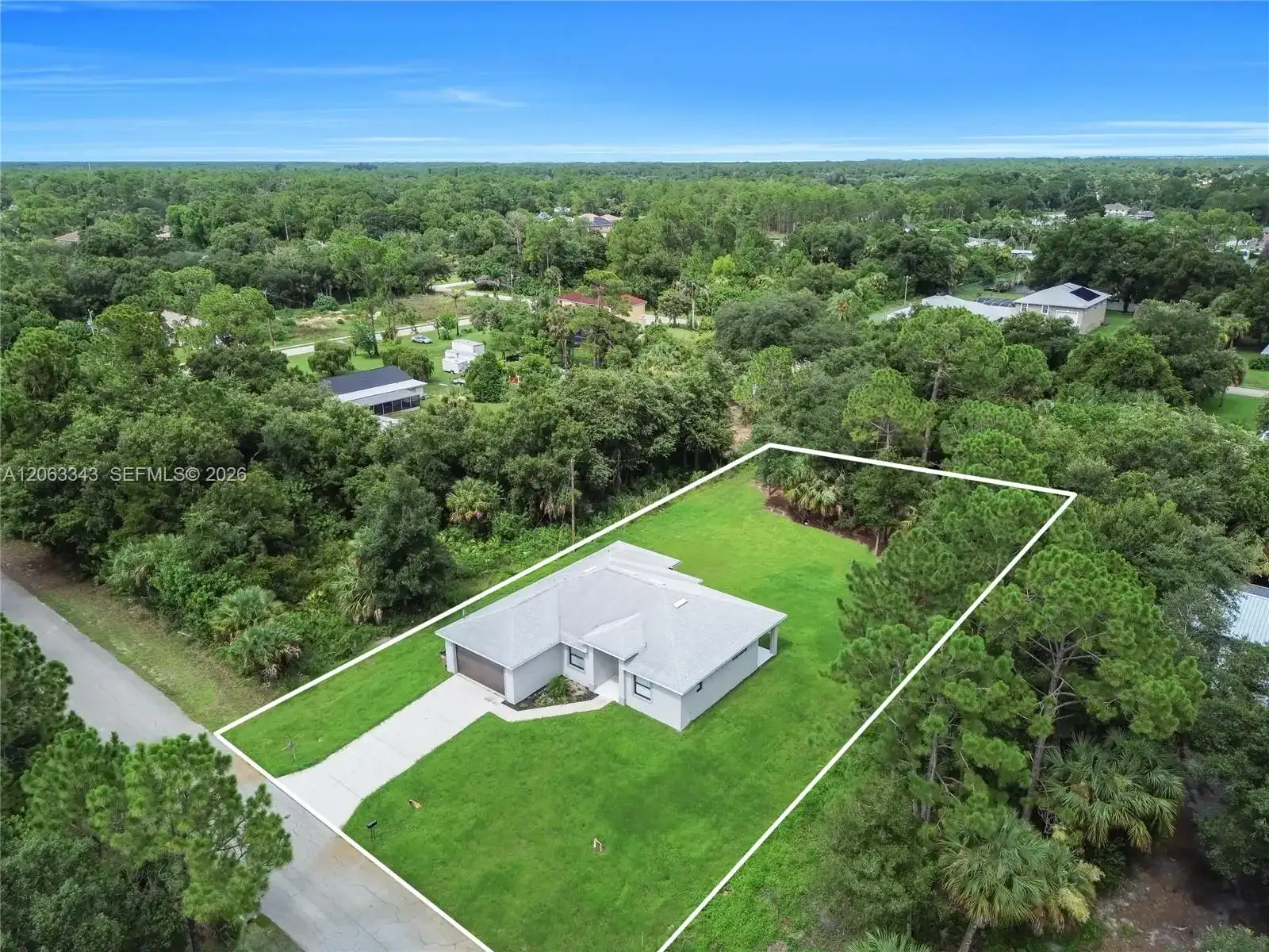 516 DAYTON AVE, Lehigh Acres FL 33972 photo 2
