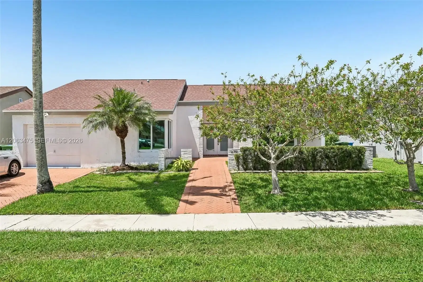 16791 Royal Poinciana Dr, Weston FL 33326