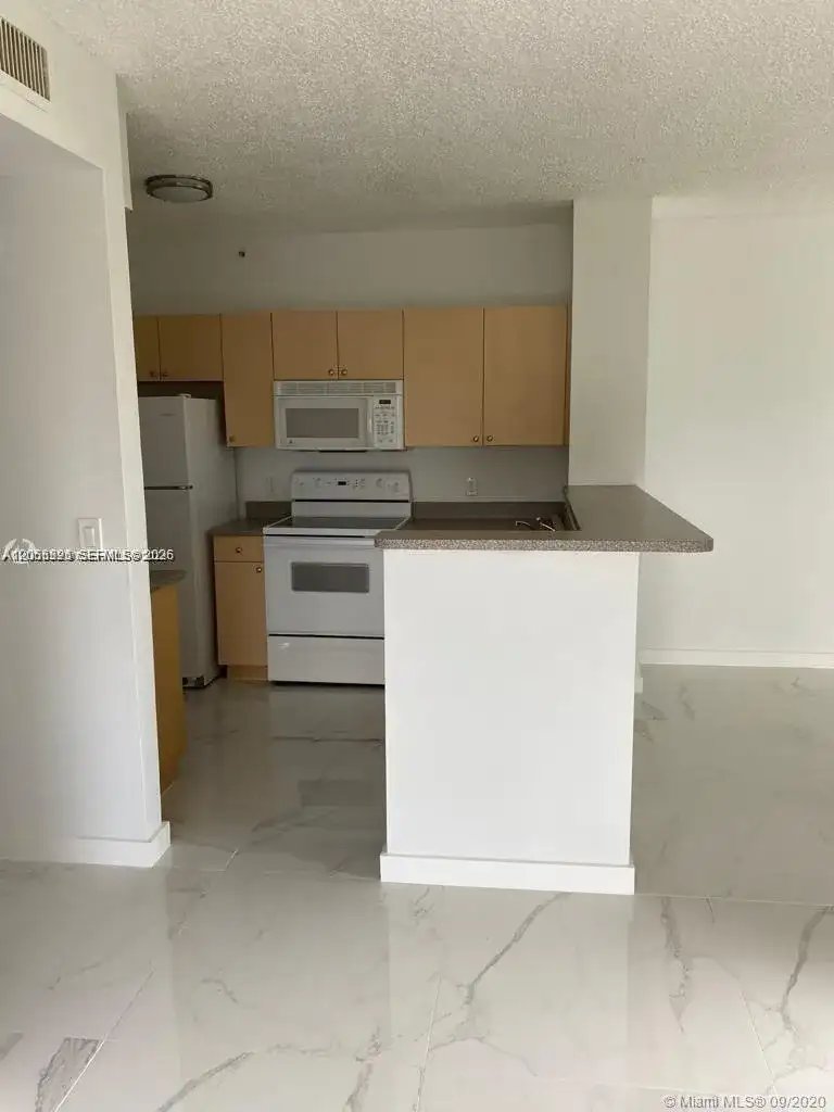 7980 N Nob Hill Rd # 102, Tamarac FL 33321 photo 2