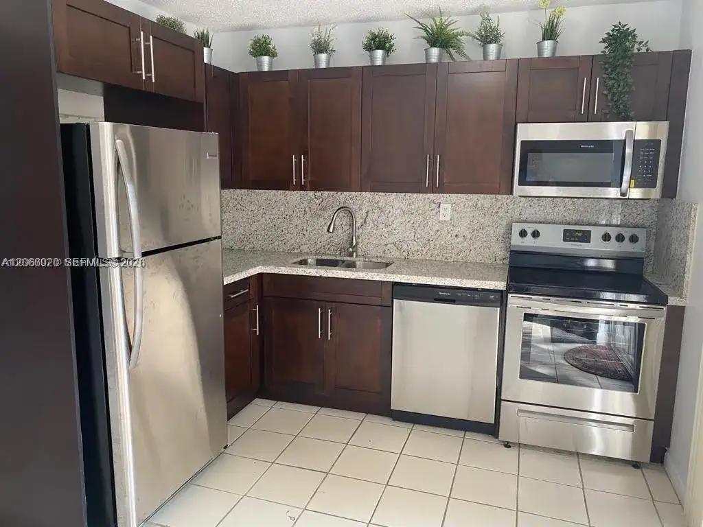 560 NW 82nd Pl # 305, Miami FL 33126 photo 2