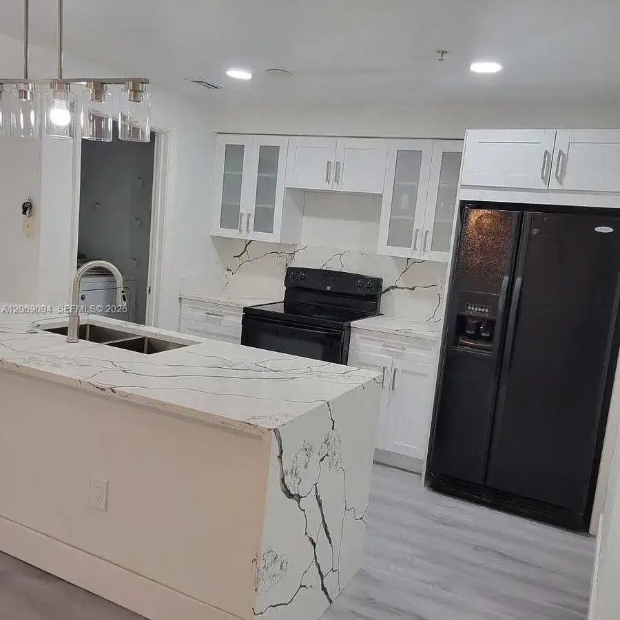 5840 W Sample Rd # 302, Coral Springs FL 33067 photo 2