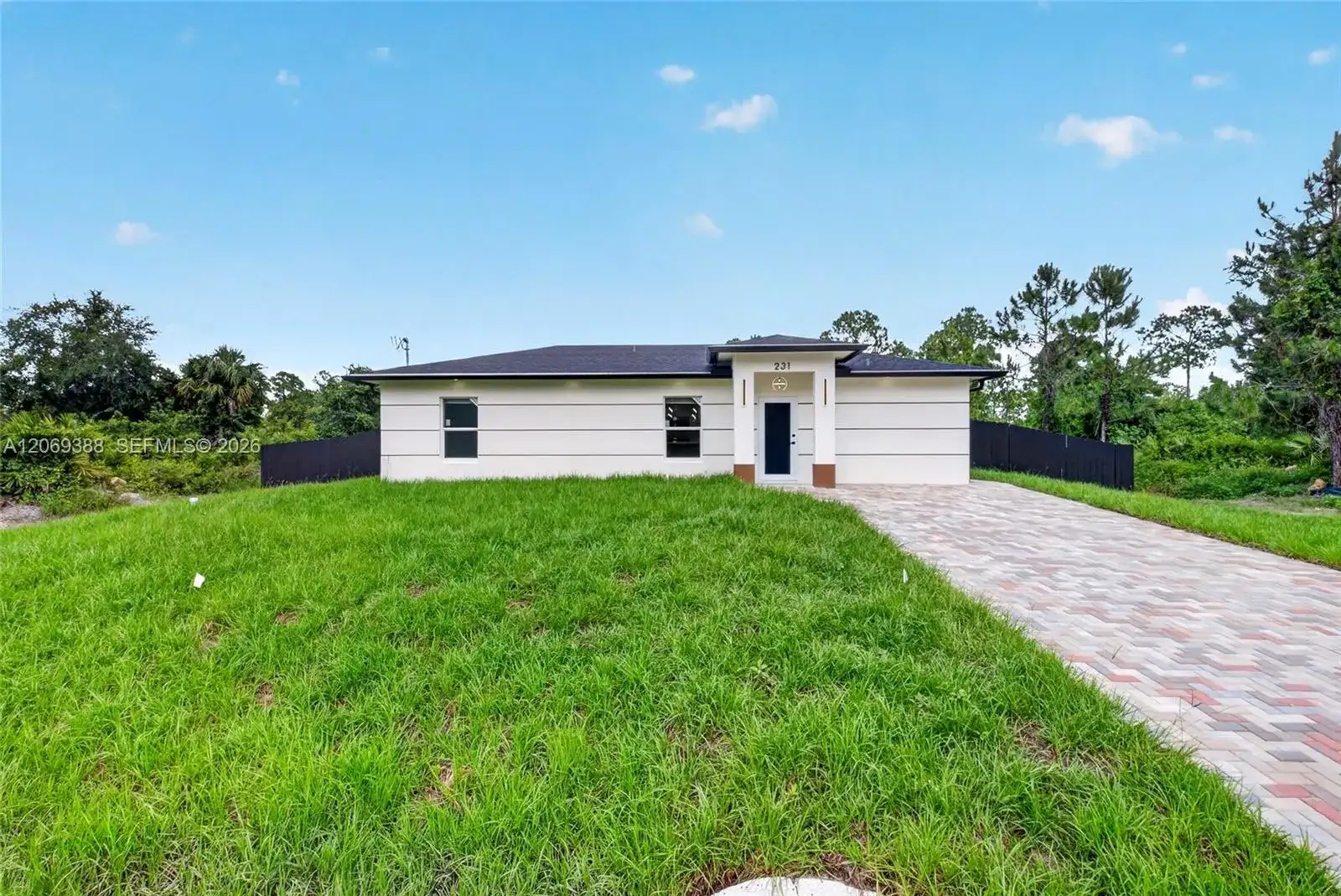 231 Andalucia Ave S, Lehigh Acres FL 33974 photo 2