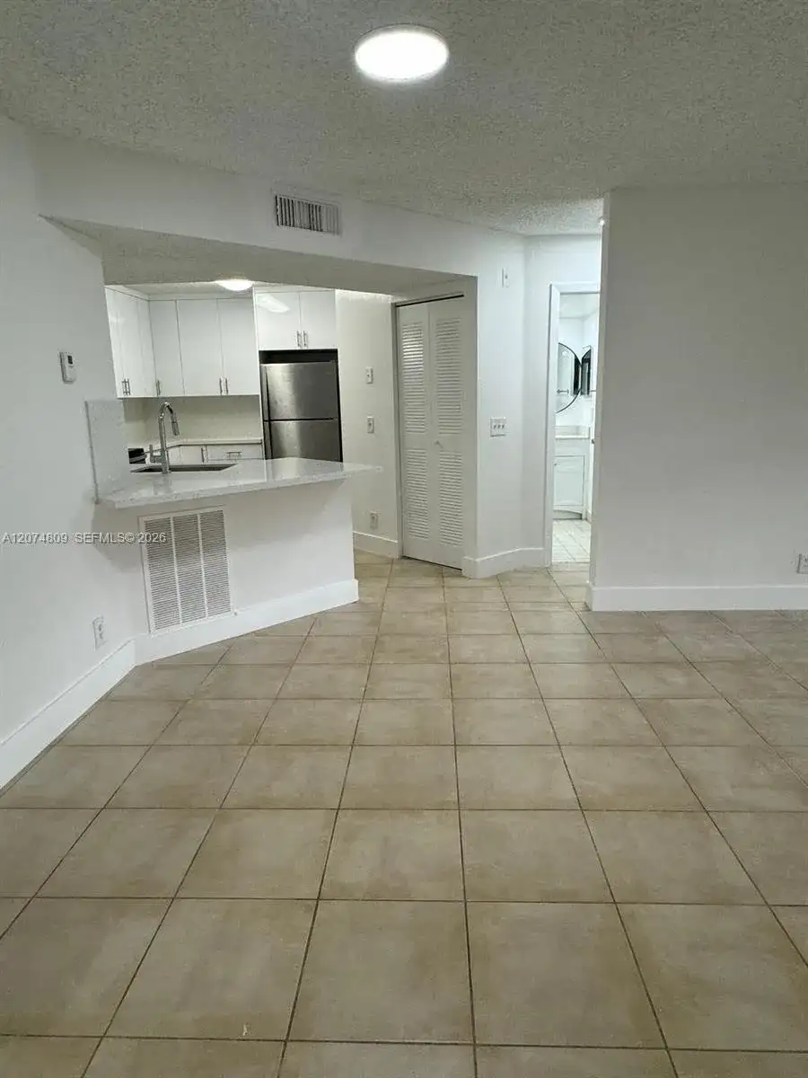 8801 Wiles Rd # 103, Coral Springs FL 33067 photo 3