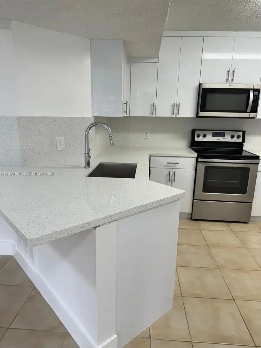 8801 Wiles Rd # 103, Coral Springs FL 33067 photo 5