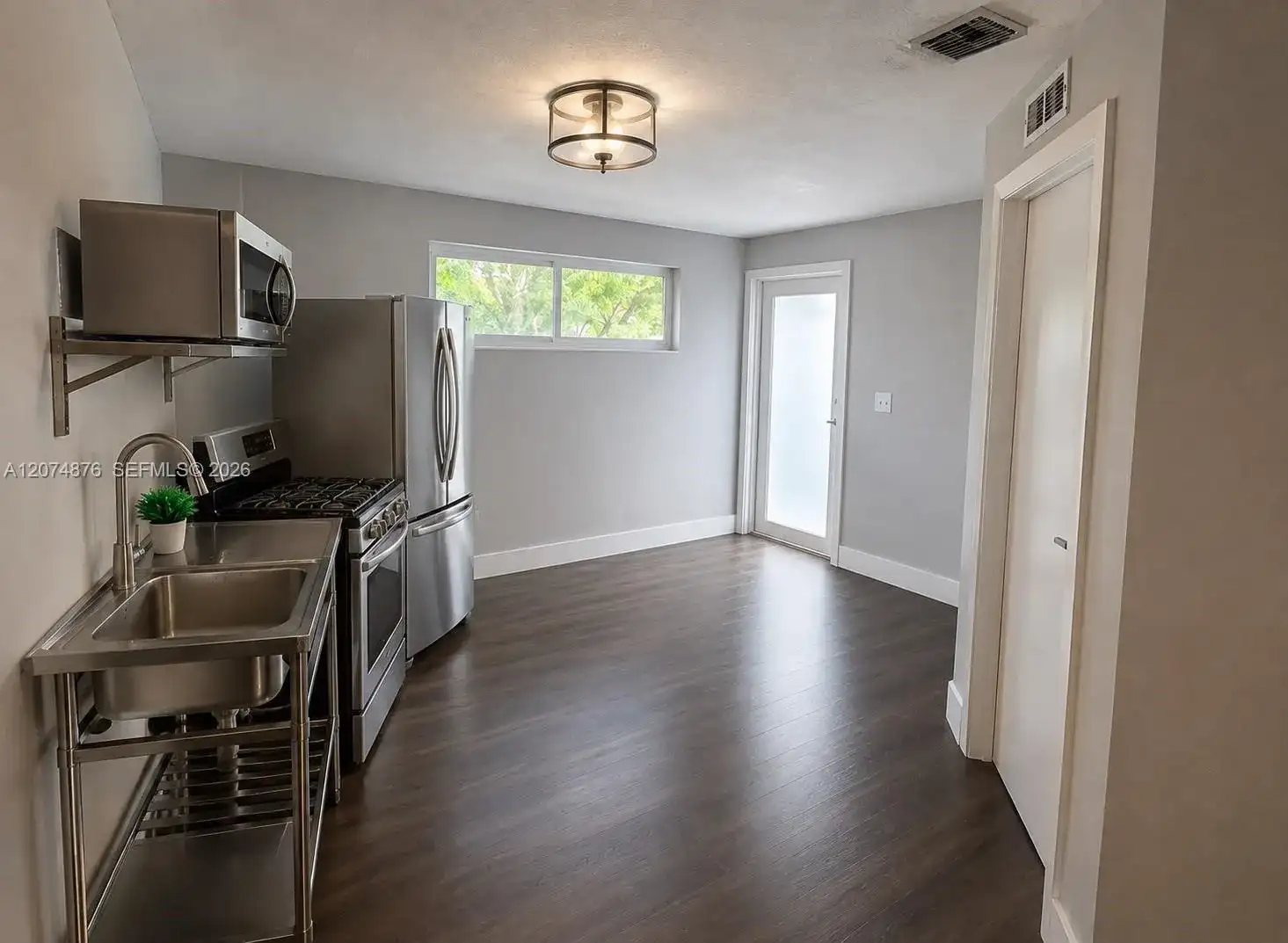 586 NW 48th St # 1, Miami FL 33127 photo 3