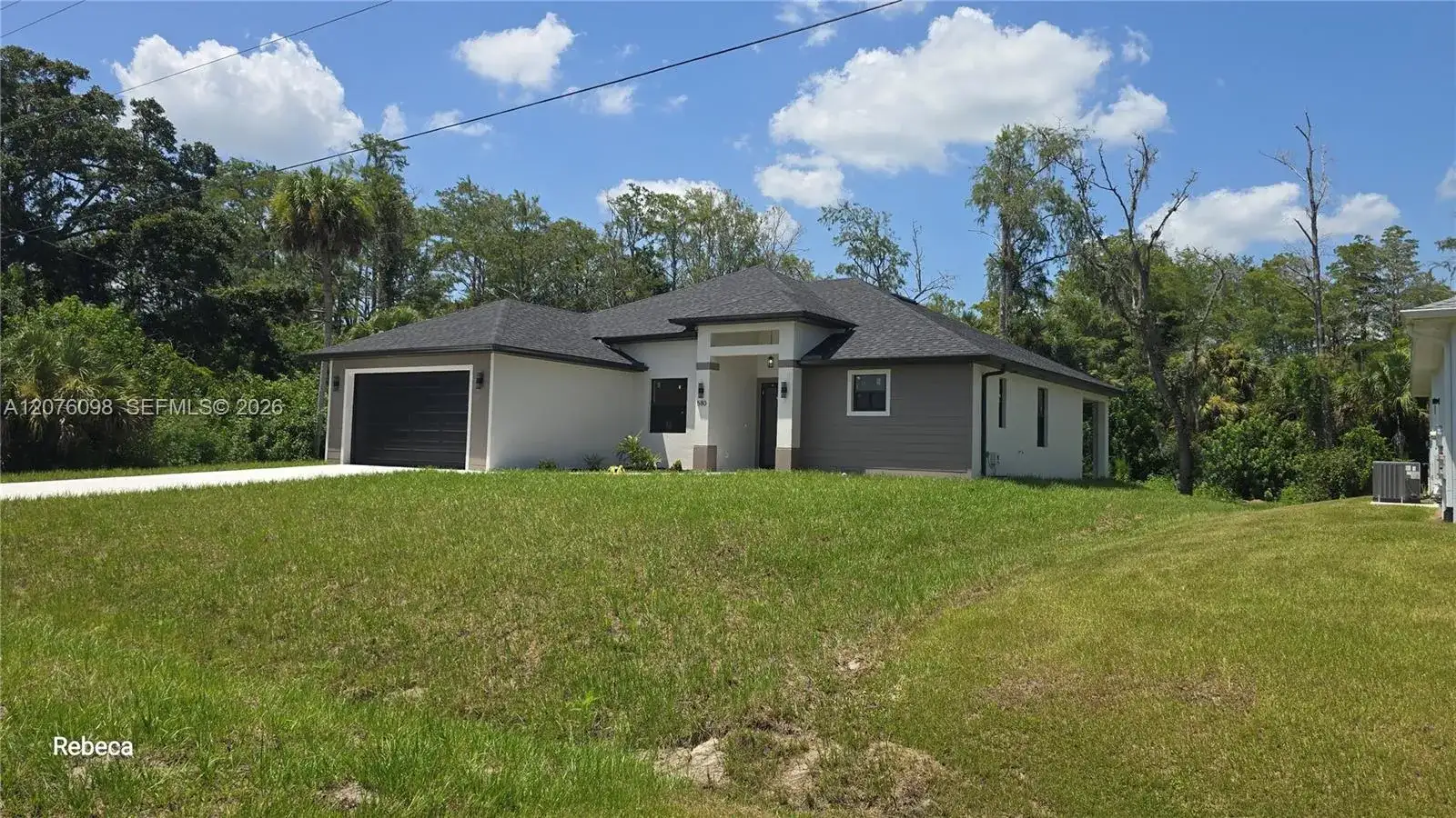 580 WOODVIEW DR, Lehigh Acres FL 33972 photo 2