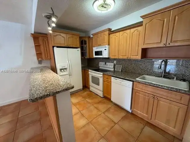 7915 SW 104th St # 104G, Miami FL 33156 photo 3