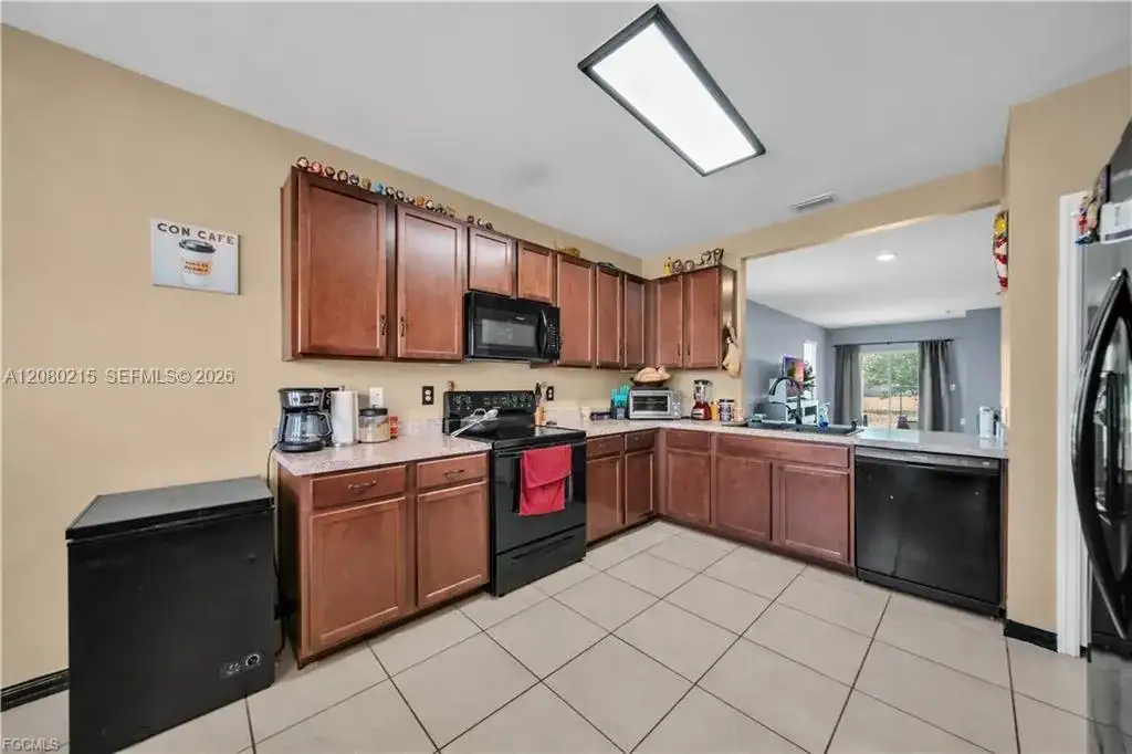 10549 Canal Brook LN, Lehigh Acres FL 33936 photo 4