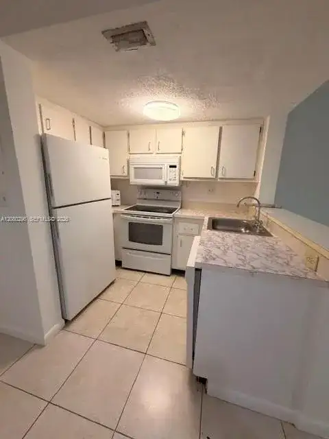 8670 NW 6th Ln # 201, Miami FL 33126 photo 4