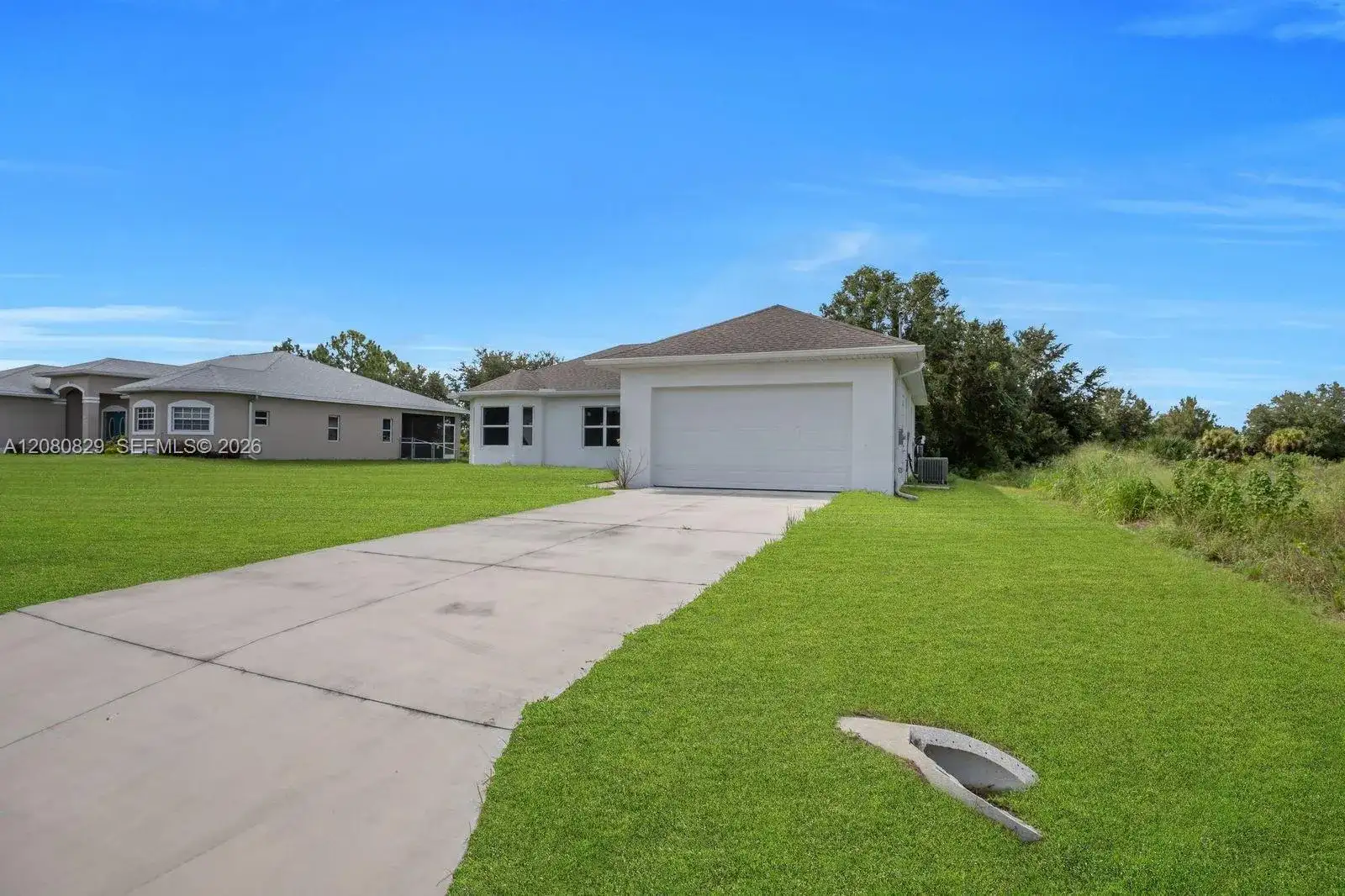 856 William Denver ST, Lehigh Acres FL 33974 photo 2