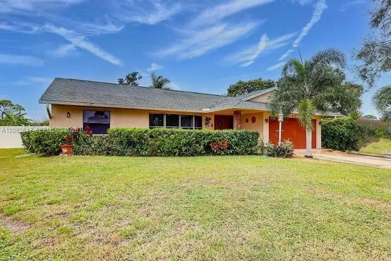 412 SW Sansom Ln, Port St. Lucie FL 34953
