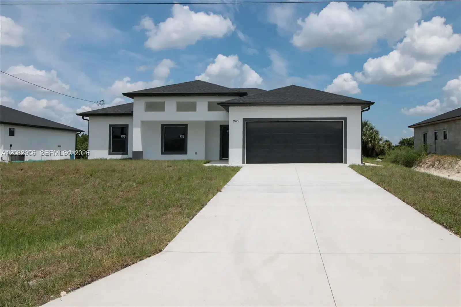 943 COMMODORE ST, Lehigh Acres FL 33974 photo 2
