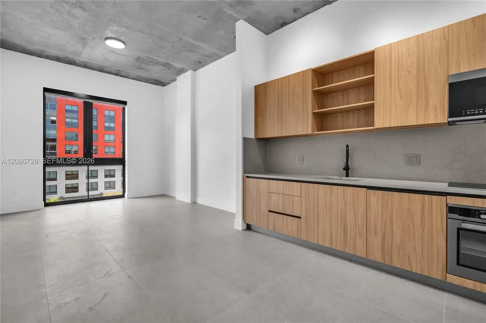 91 NW 27th St # 403, Miami FL 33127 photo 2