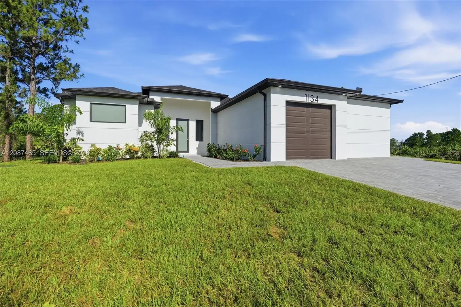 1134 Holmes AVE S, Lehigh Acres FL 33974 photo 2