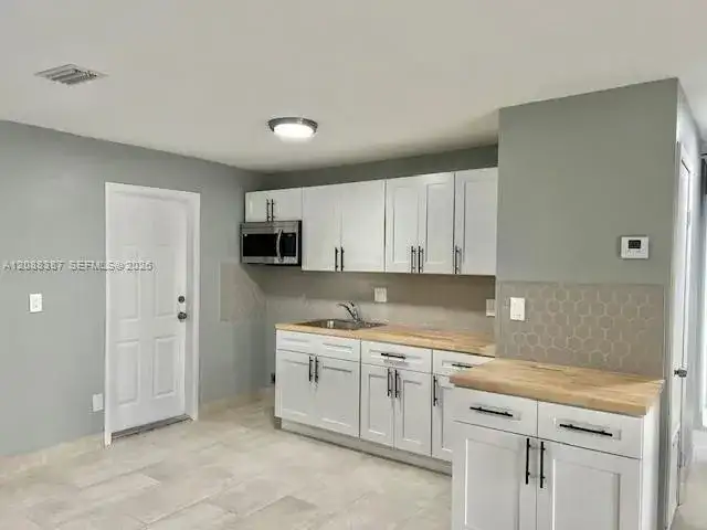 1436 NW 24th Ter, Fort Lauderdale FL 33311 photo 2