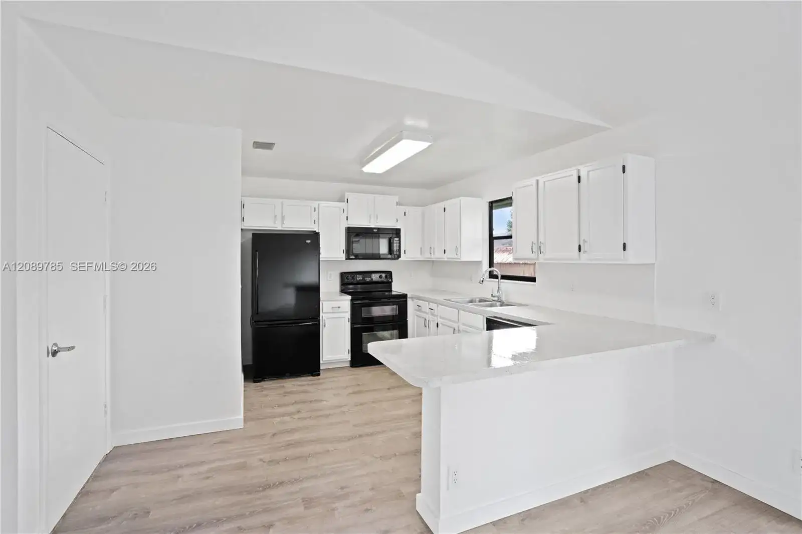 6043 Felter St, Jupiter FL 33458 photo 2
