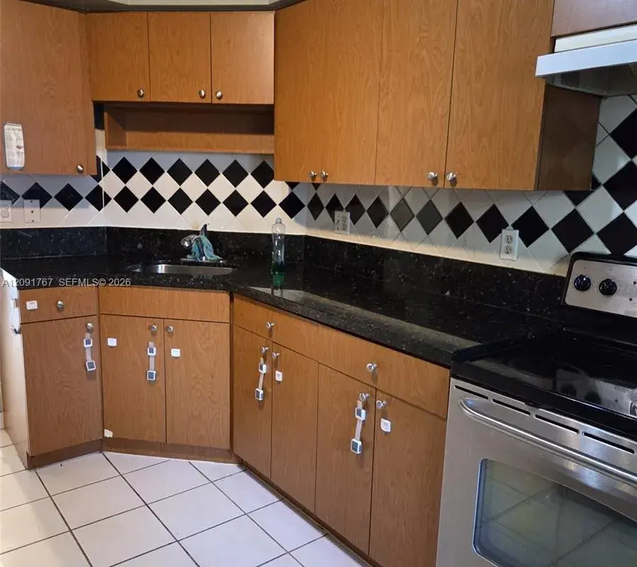 9101 W Sample Rd # 102, Coral Springs FL 33065
