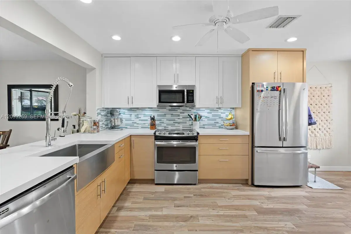 3329 Deer Creek Lake Shore Dr, Deerfield Beach FL 33442