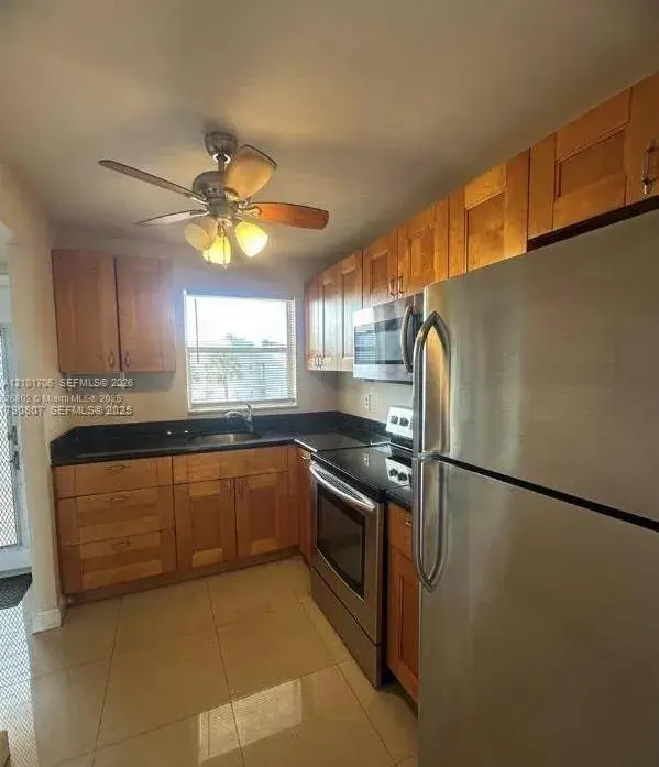 8400 Sunrise Lakes Blvd # 310, Sunrise FL 33322