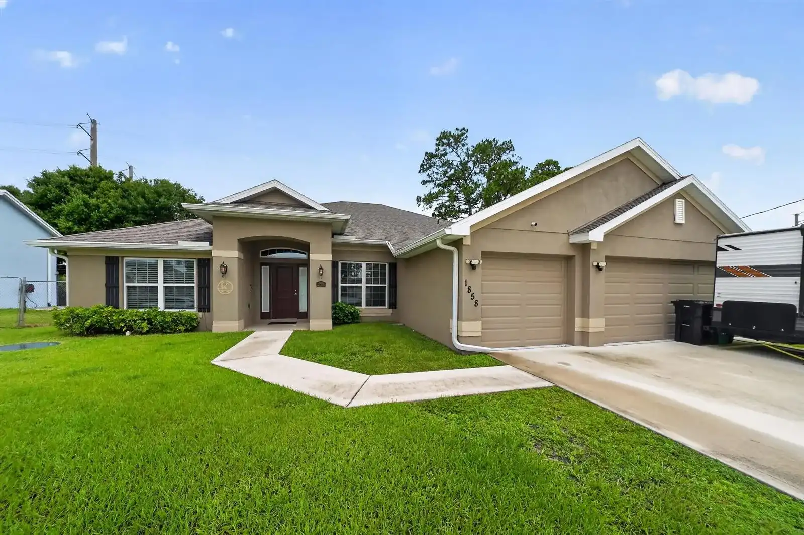 1858 SW Mackenzie Street, Port St. Lucie FL 34953